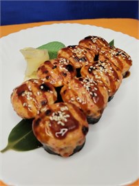 {{photo.Alt || photo.Description || 'Запечёный ролл с угрём'}}